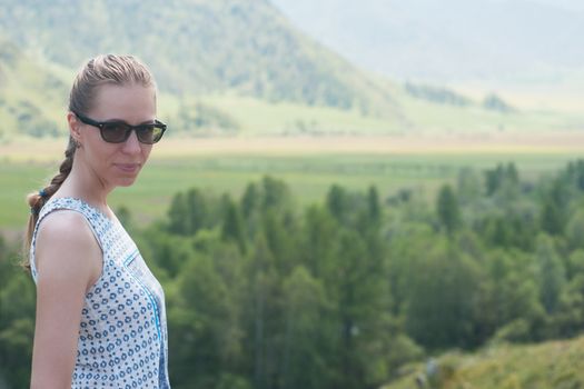 Woman portrait in he mountains