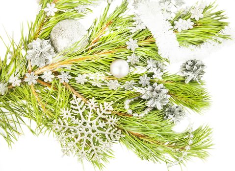New year composition with fir tree, artificial snowflake and silver ball close up