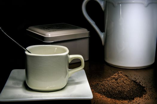 cofee cup of cofee and cofee grain