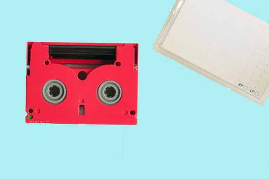 Red 8mm cassette with its box