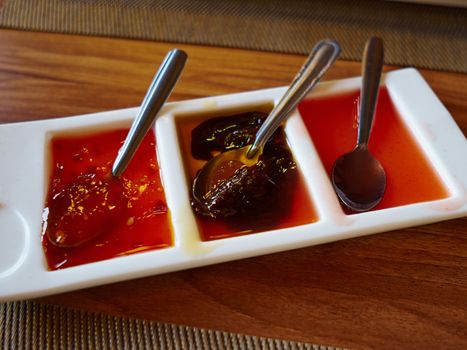 Selection of different Chinese sauces served on the table