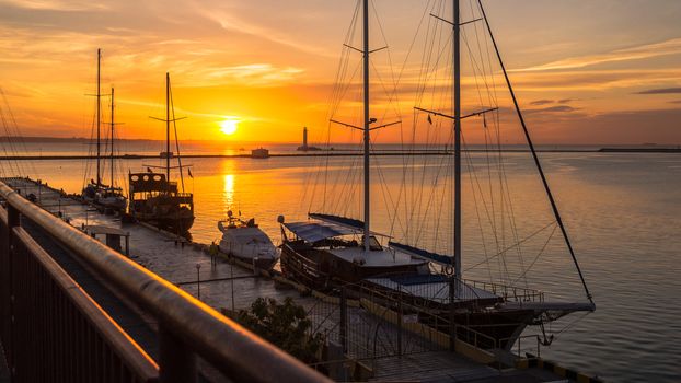 Yachts at dawn in the seaport