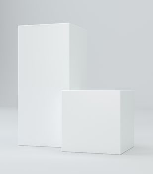 Two white cubes on gray background. 3d rendering.