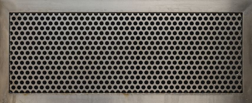 Perforated metal plate. Texture for your design