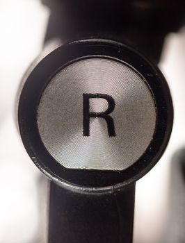 close up of right headphone letter R; UK