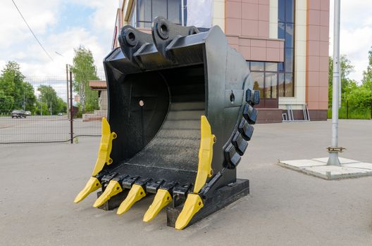 New road-construction equipment outdoors on the exhibition