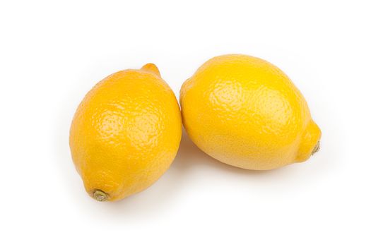 lemons isolated on white background, two yellow lemons