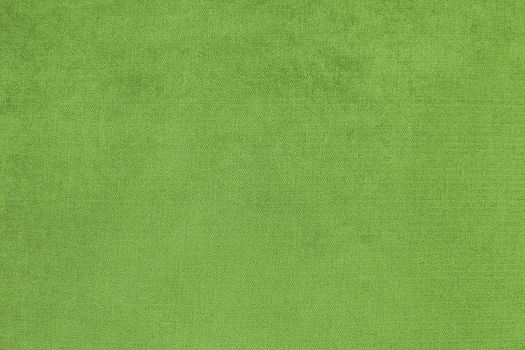 Background with green texture, velvet fabric, close-up
