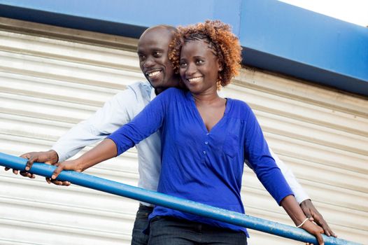These young people glued against each other, are happy to be together.
