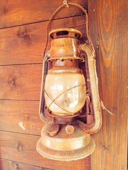 Old Lantern On Wooden Wall