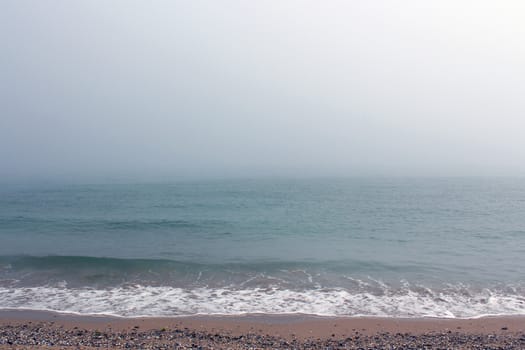 Sea shore in a foggy day