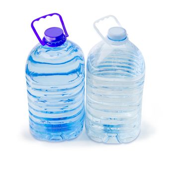 One blue and one transparent large plastic bottles with carrying handles with drinking water on a white background
