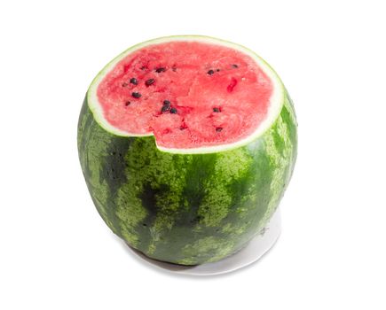 Watermelon with rind with dark green stripes and deep red flesh with partially cut upper part on a white background

