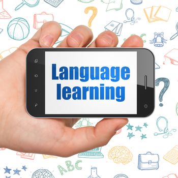 Learning concept: Hand Holding Smartphone with  blue text Language Learning on display,  Hand Drawn Education Icons background, 3D rendering
