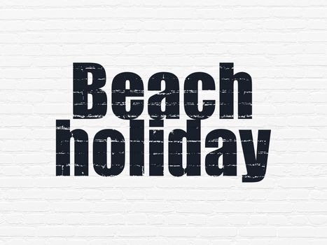 Travel concept: Painted black text Beach Holiday on White Brick wall background