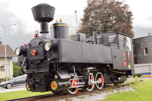 Old steam locomotive on track in Austrian tyrol