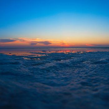 Beauty sunset on salty lake in Altay, Siberia, Russia