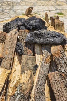 beauty stacked dry wood and coal for the hearth.close