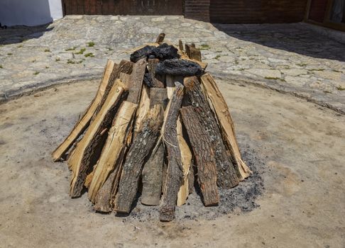 beauty stacked dry wood and coal for the hearth