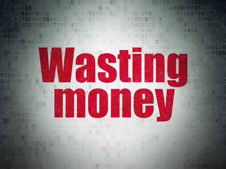 Money concept: Painted red word Wasting Money on Digital Data Paper background