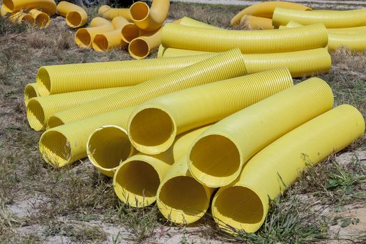 Yellow drain pipe - construction site.