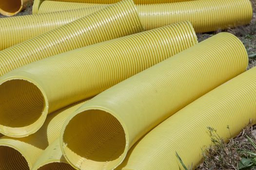 Yellow drain pipe - construction site.