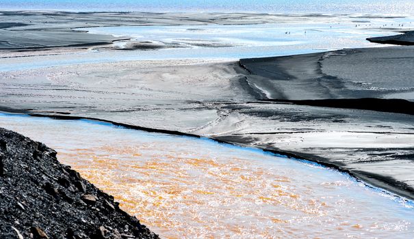 Production waste is accumulated in water.