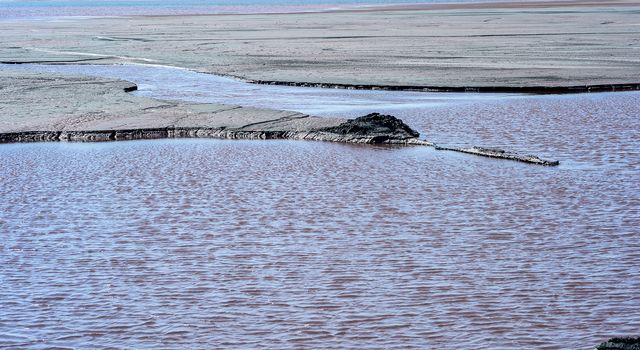 Production waste is accumulated in water.