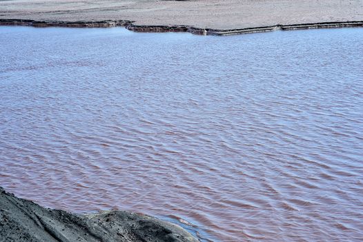 Production waste is accumulated in water.