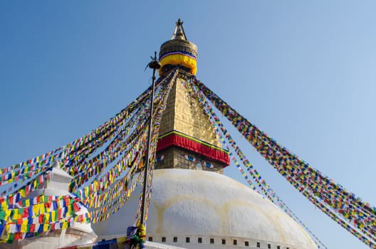 the famous buuha eye gazing out sleepily from each side of the tower are those of the all seeing primordial buddha.perched a top a hill on the western edge of the kathmandu valley.