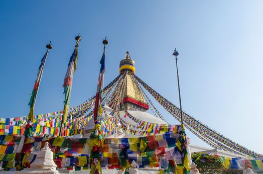 the famous buuha eye gazing out sleepily from each side of the tower are those of the all seeing primordial buddha.perched a top a hill on the western edge of the kathmandu valley.