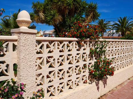 Details of a fence of traditional classical local Spanish style house private villa home real estate Spain    