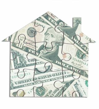 Dollar house jigsaw puzzle over a white background
