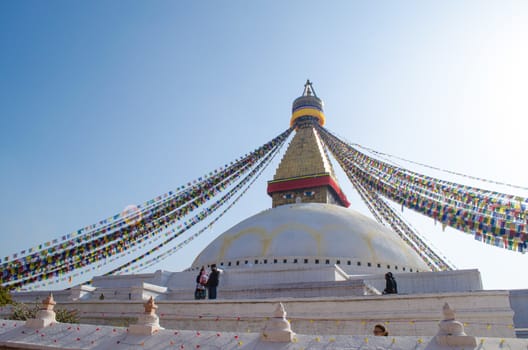 the famous buuha eye gazing out sleepily from each side of the tower are those of the all seeing primordial buddha.perched a top a hill on the western edge of the kathmandu valley.