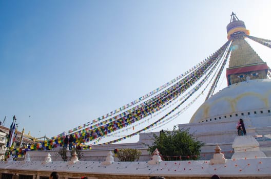 the famous buuha eye gazing out sleepily from each side of the tower are those of the all seeing primordial buddha.perched a top a hill on the western edge of the kathmandu valley.