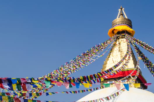 the famous buuha eye gazing out sleepily from each side of the tower are those of the all seeing primordial buddha.perched a top a hill on the western edge of the kathmandu valley.