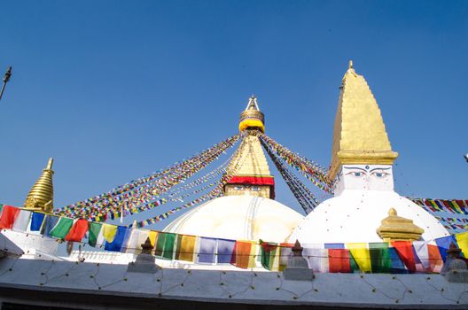 the famous buuha eye gazing out sleepily from each side of the tower are those of the all seeing primordial buddha.perched a top a hill on the western edge of the kathmandu valley.