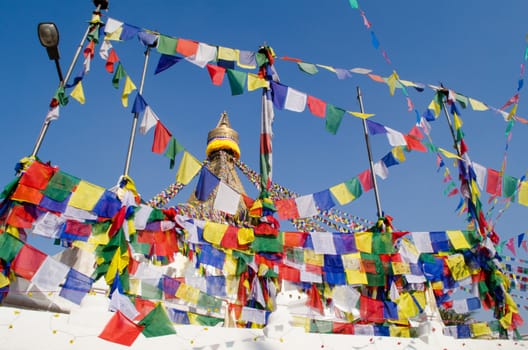 the famous buuha eye gazing out sleepily from each side of the tower are those of the all seeing primordial buddha.perched a top a hill on the western edge of the kathmandu valley.