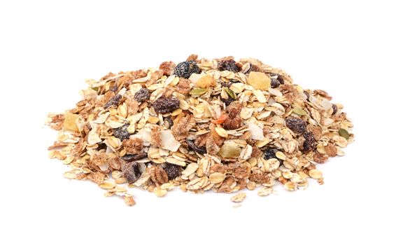 Muesli - cereal flakes with seeds, mixed fruit and nuts, isolated on a white background