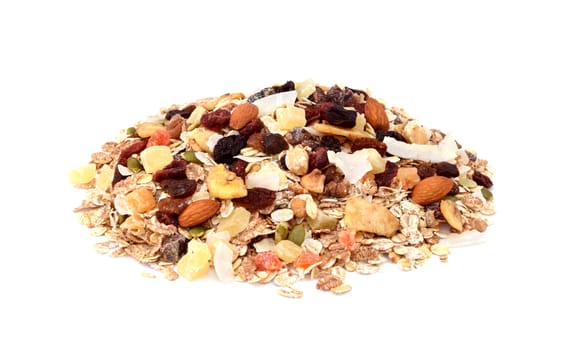 Muesli - mixed fruit and nuts with cereal flakes and seeds, isolated on a white background