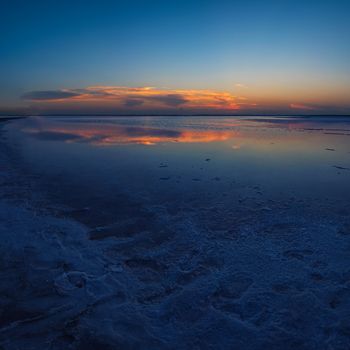 Beauty sunset on salty lake in Altay, Siberia, Russia