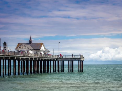 People Enjoying a Sunny Day Out on Southwold Pier