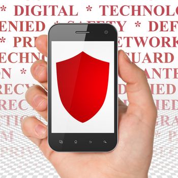 Protection concept: Hand Holding Smartphone with  red Shield icon on display,  Tag Cloud background, 3D rendering