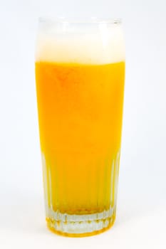 Glass of cold beer on a white background