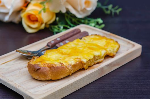 toasted homemade garlic bread, melted cheddar and mozzarella, topped with parmesan chesse