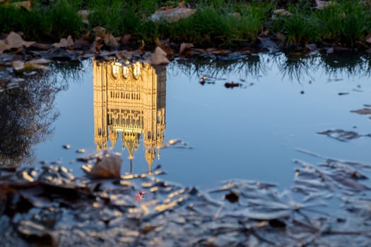 Reflection of the Houses of Parliament in a Puddle