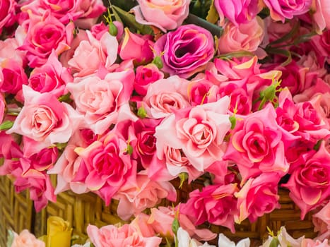 Bouquet of pink roses in a basket