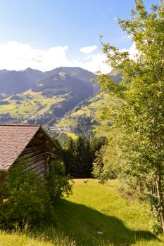 View of a valley and green hills in the Austrian Tyrol