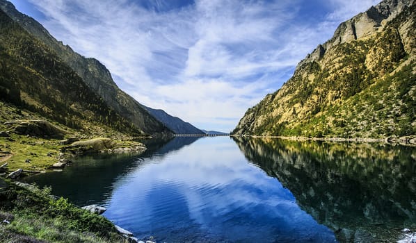 Mountains and lake photo with reflection