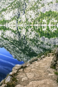 Mountains and lake photo with reflection